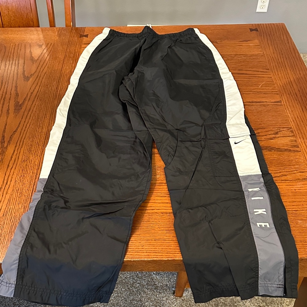 Men’s vintage Nike online track pants size XL inseam measures about 32.5”